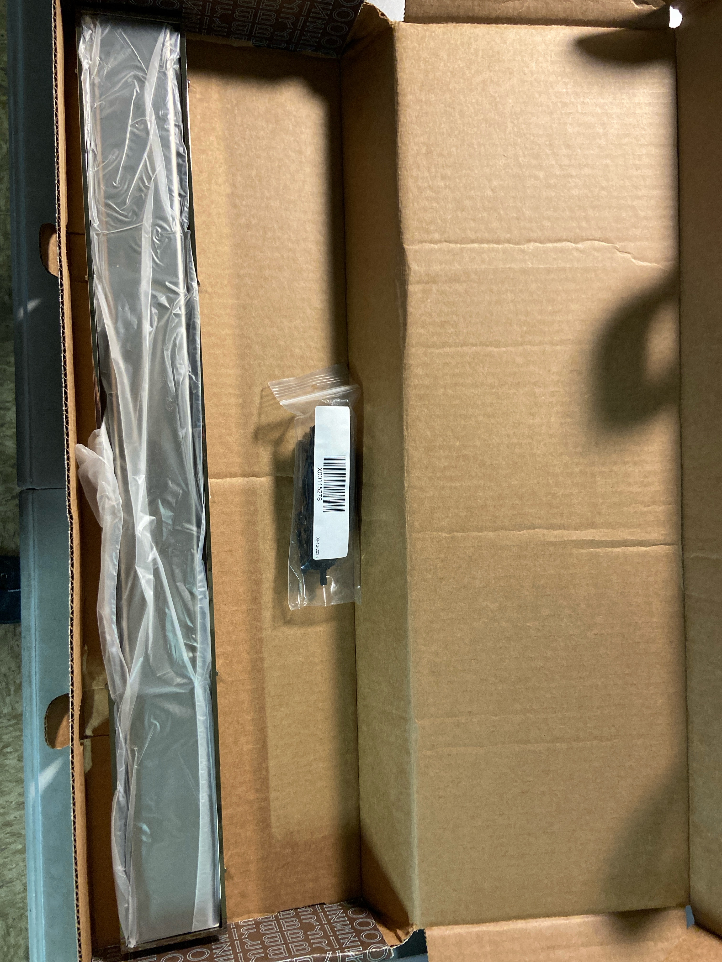 Actual inventory photograph: Brizo BT0732416-PN 24" Reversible Linear Shower Drain with Dual Grate Installation - Less Rough In - Brilliance Polished Nickel