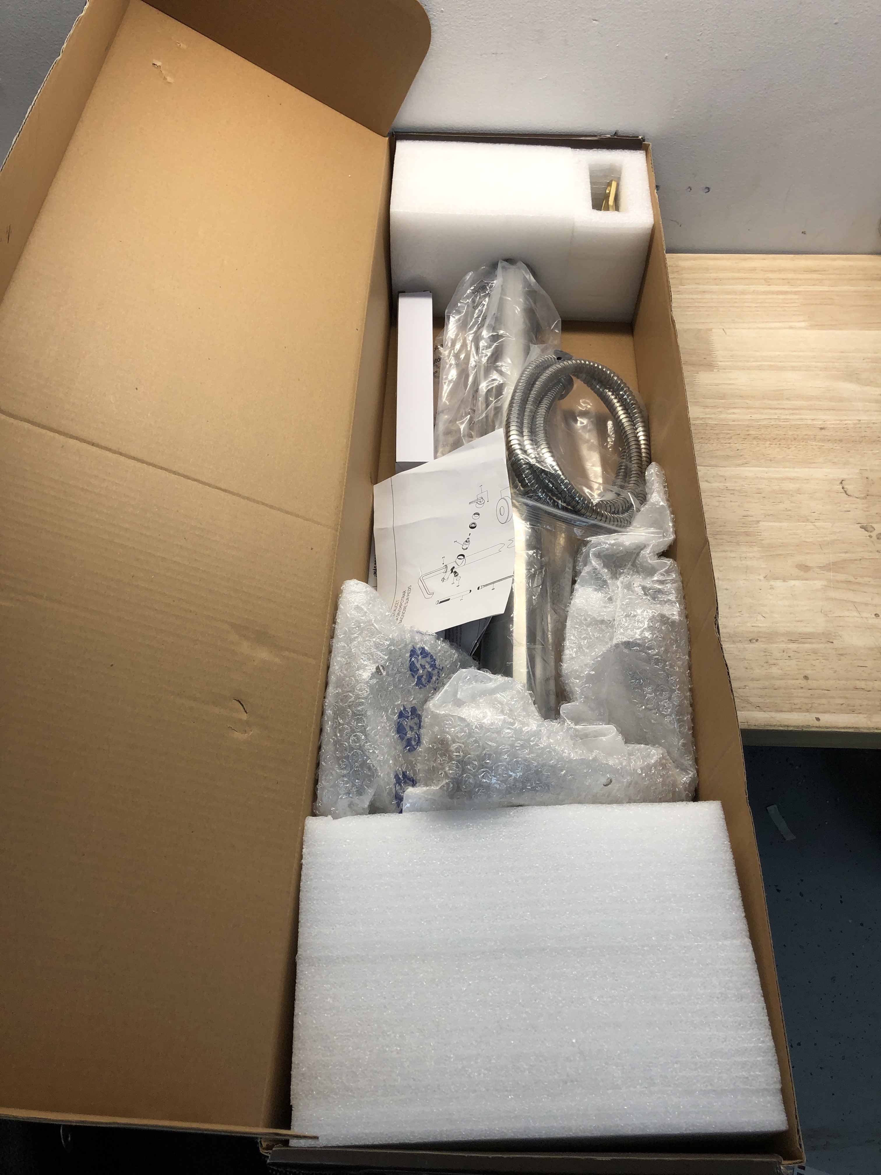 Actual inventory photograph: Signature Hardware SHDRFS2000GZBN Drea Floor Mounted Tub Filler with Built-In Diverter - Includes Hand Shower - Brushed Nickel