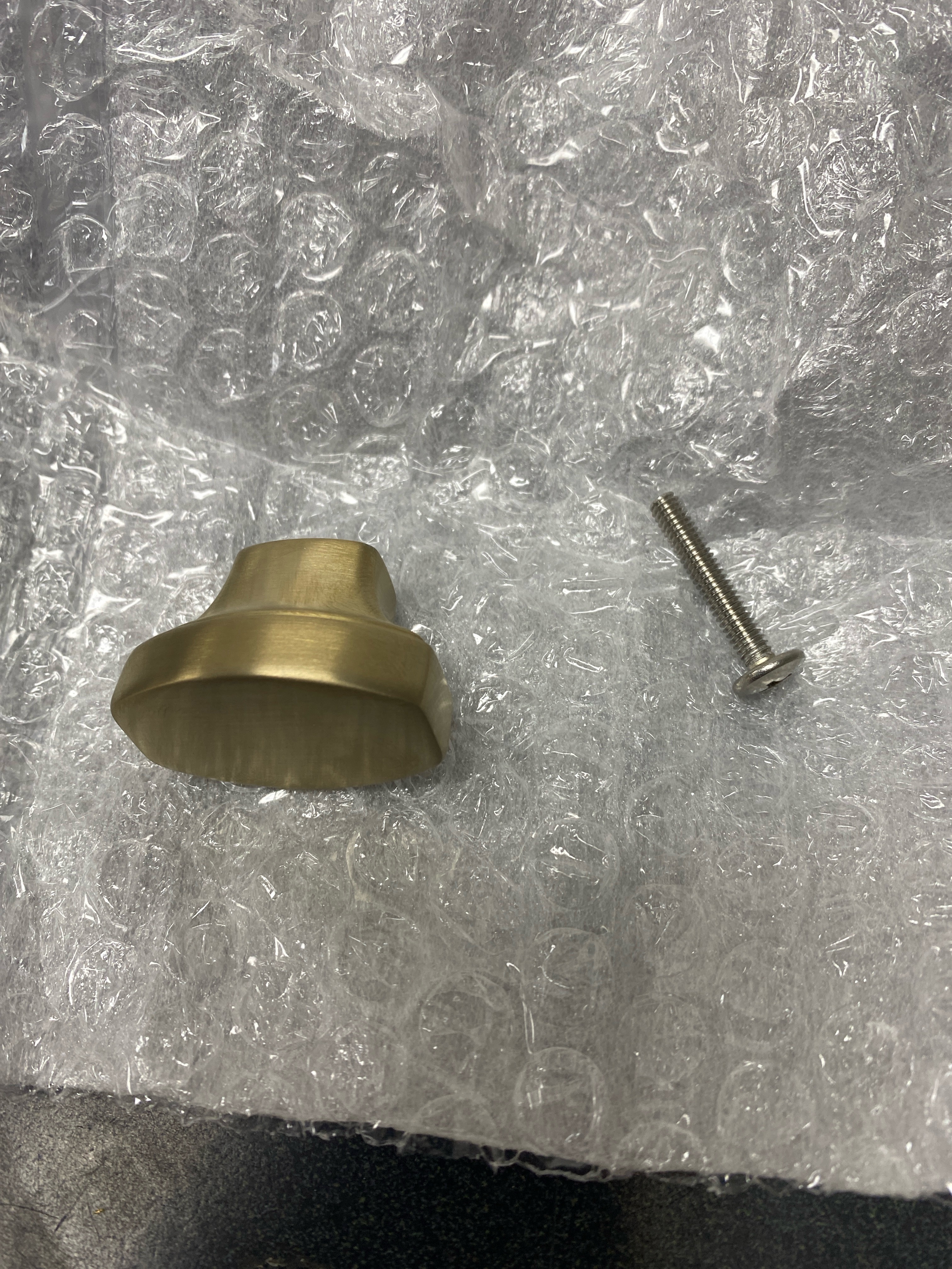 Actual inventory photograph: Kallista P30800-00-BAF Transitional 1-7/16 Inch Long Oval Cabinet Knob - Brushed French Gold