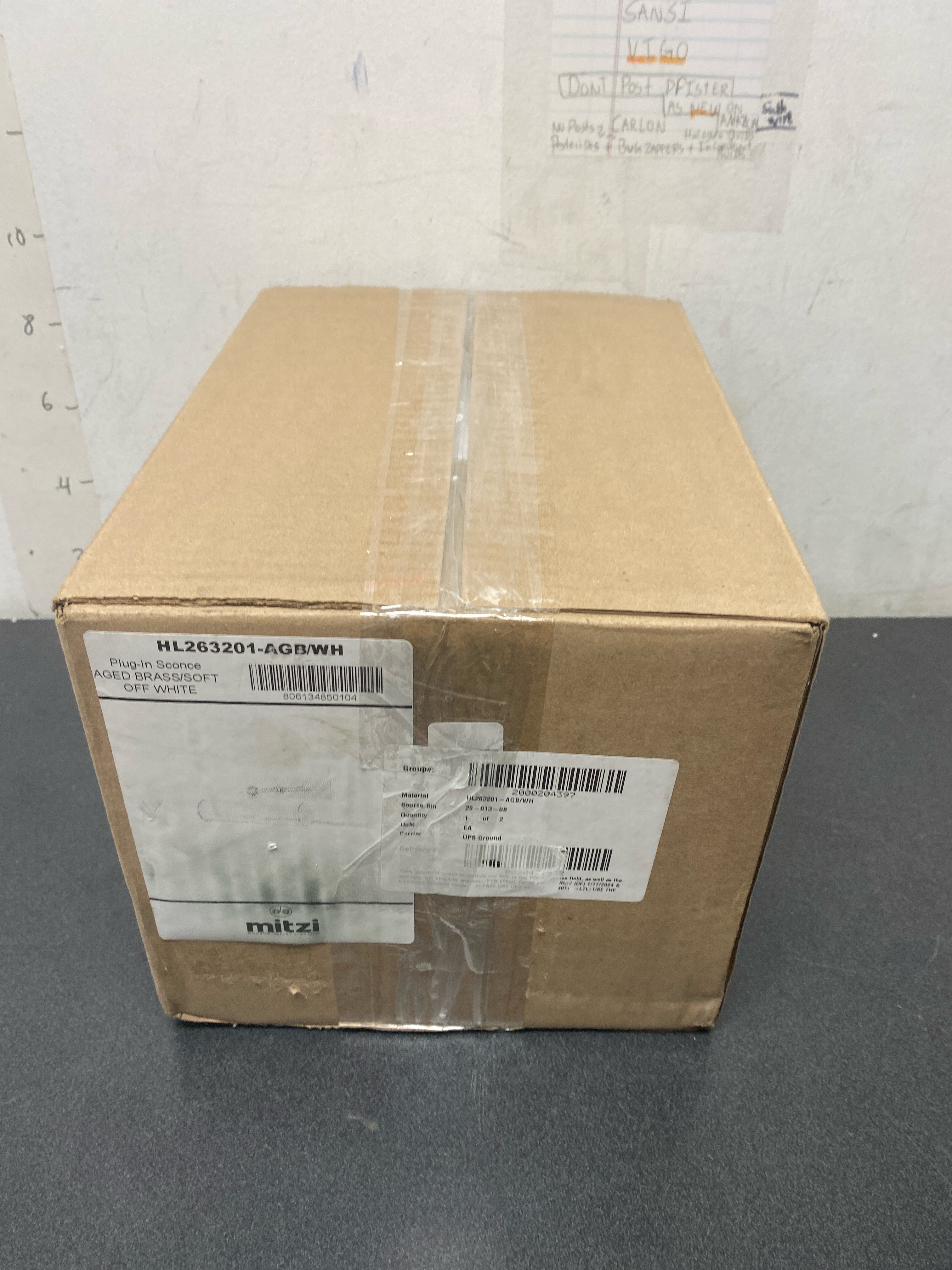 Actual inventory photograph: Mitzi HL263201-AGB/WH Holly 8" Wide Plug-In Picture Light - Aged Brass / White