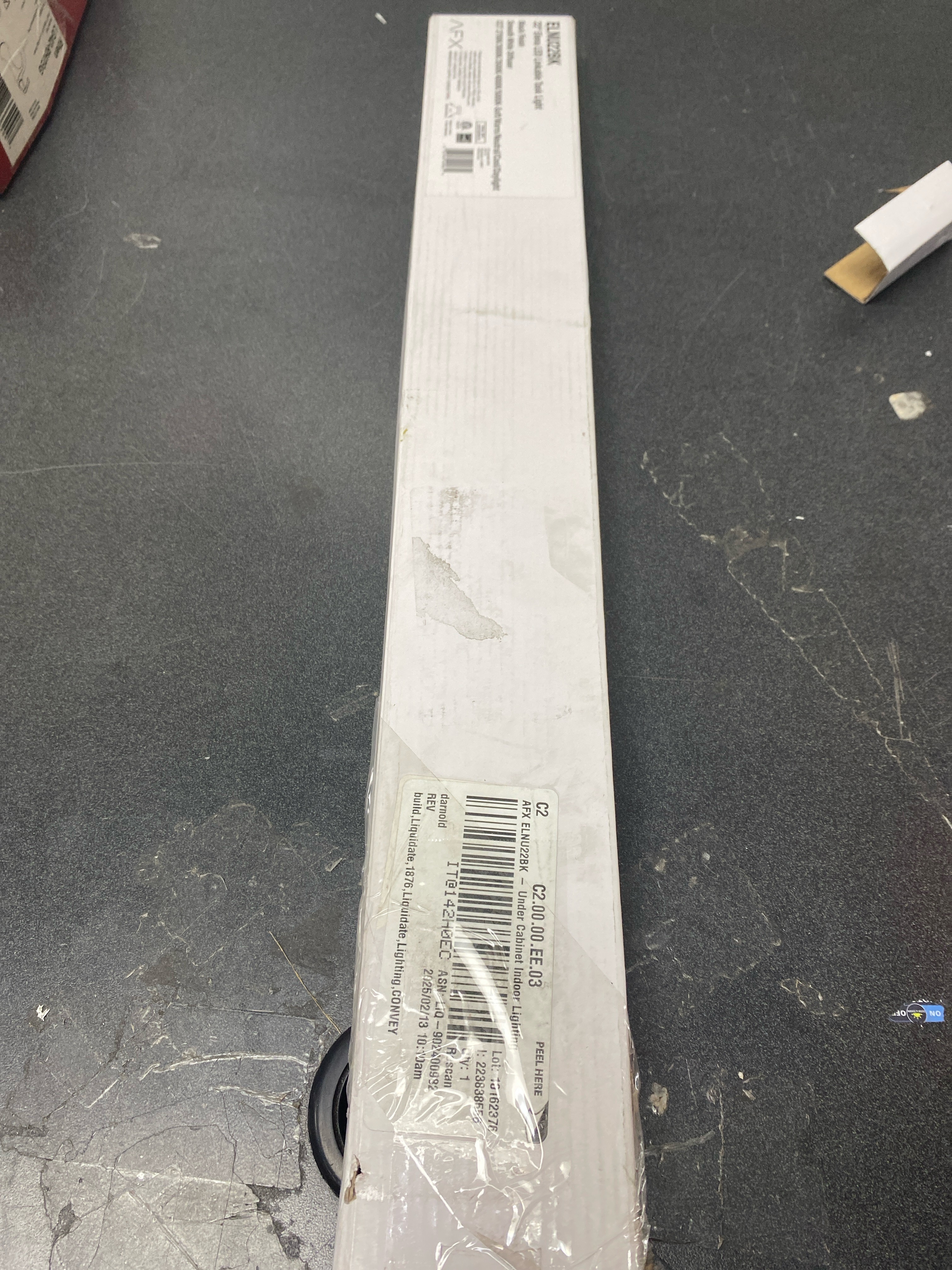 Actual inventory photograph: Afx ELNU22BK Elena 2.75 in. Hardwired Black Integrated LED Under Cabinet Light