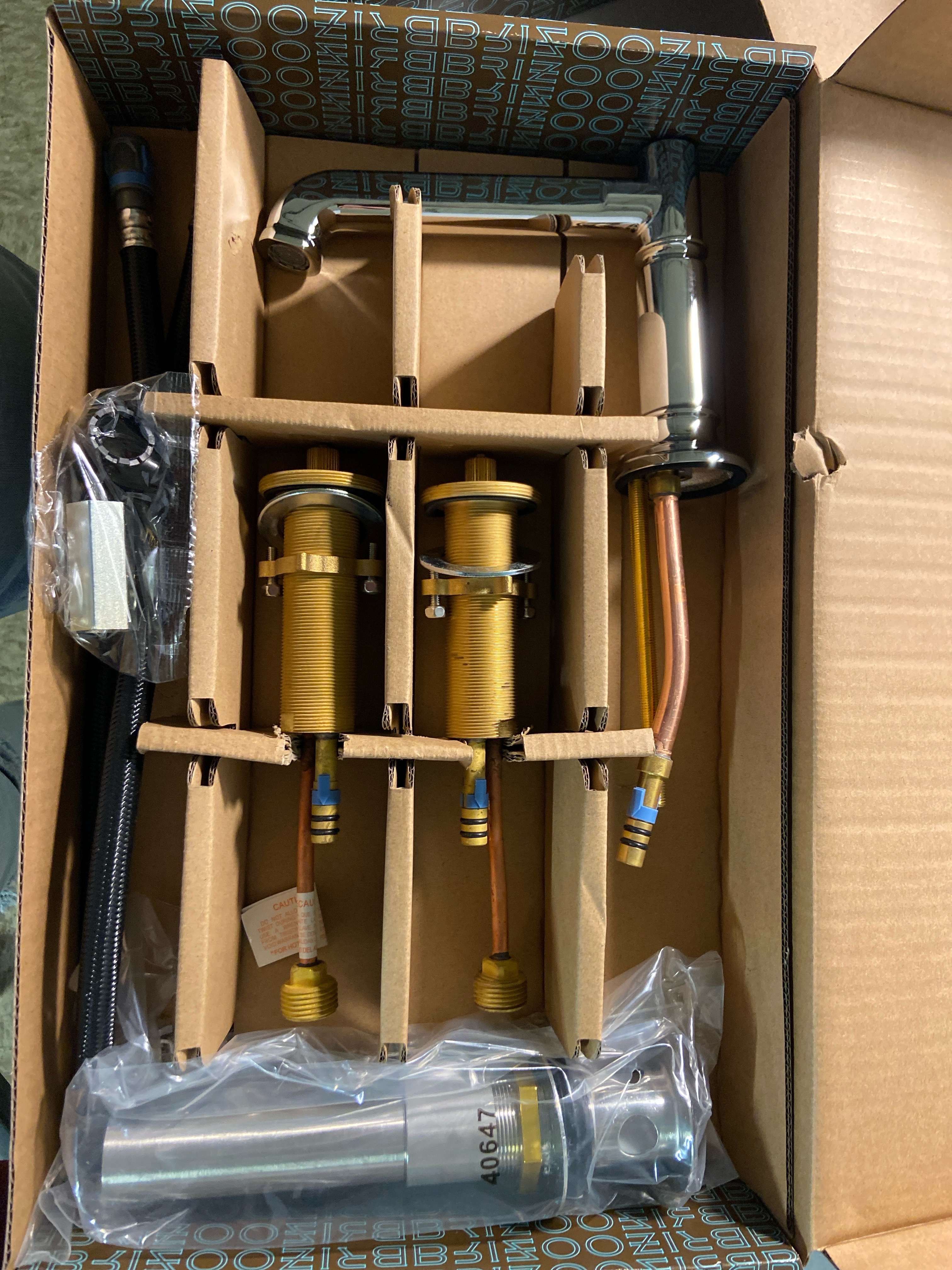 Actual inventory photograph: Brizo 65377LF-PCLHP-ECO Invari 1.2 GPM Widespread Bathroom Faucet with Pop-Up Drain Assembly Less Handles - Chrome