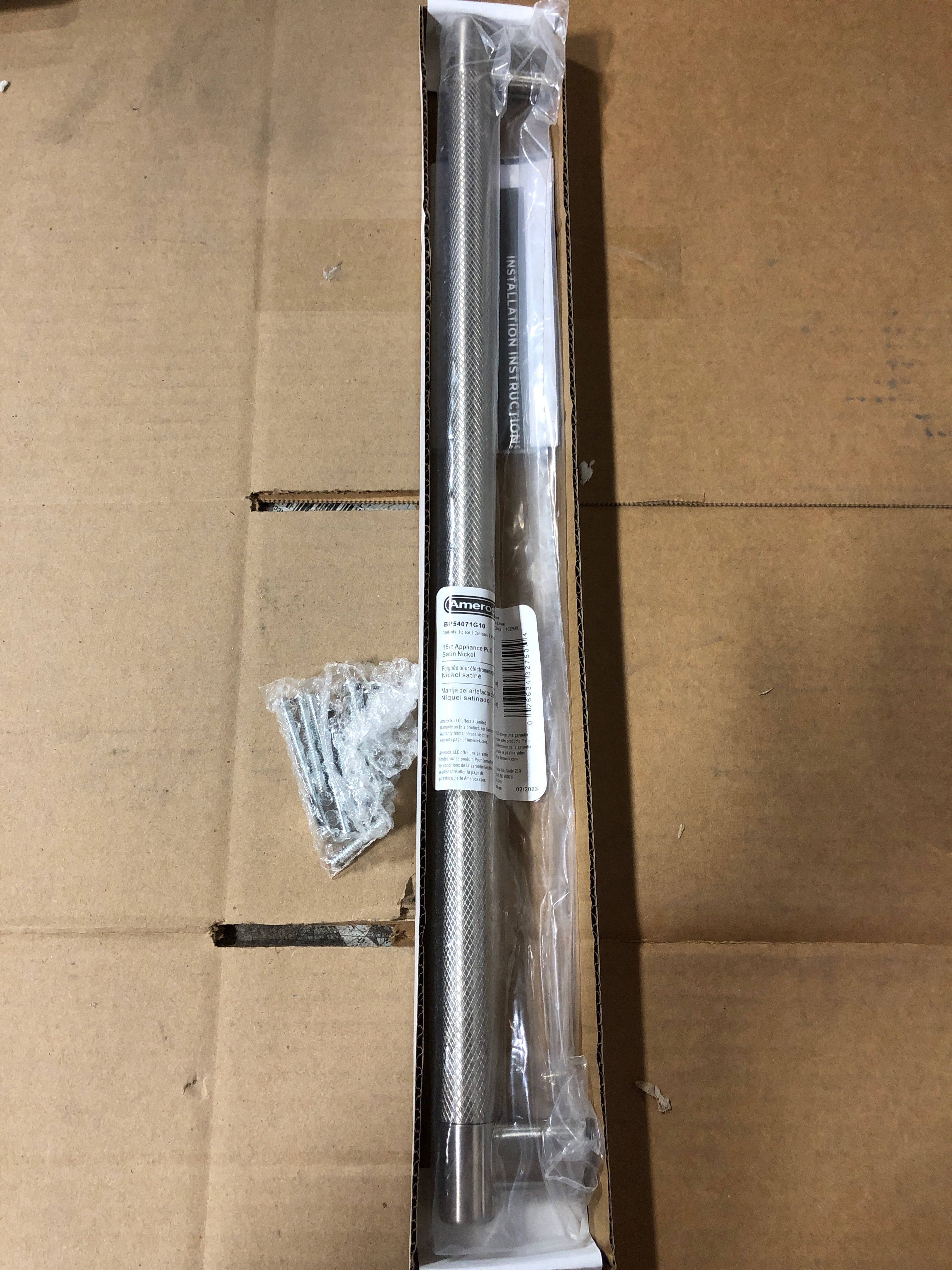 Actual inventory photograph: Amerock BP54071G10 Bronx 18 Inch Center to Center Bar Cabinet Pull - Satin Nickel