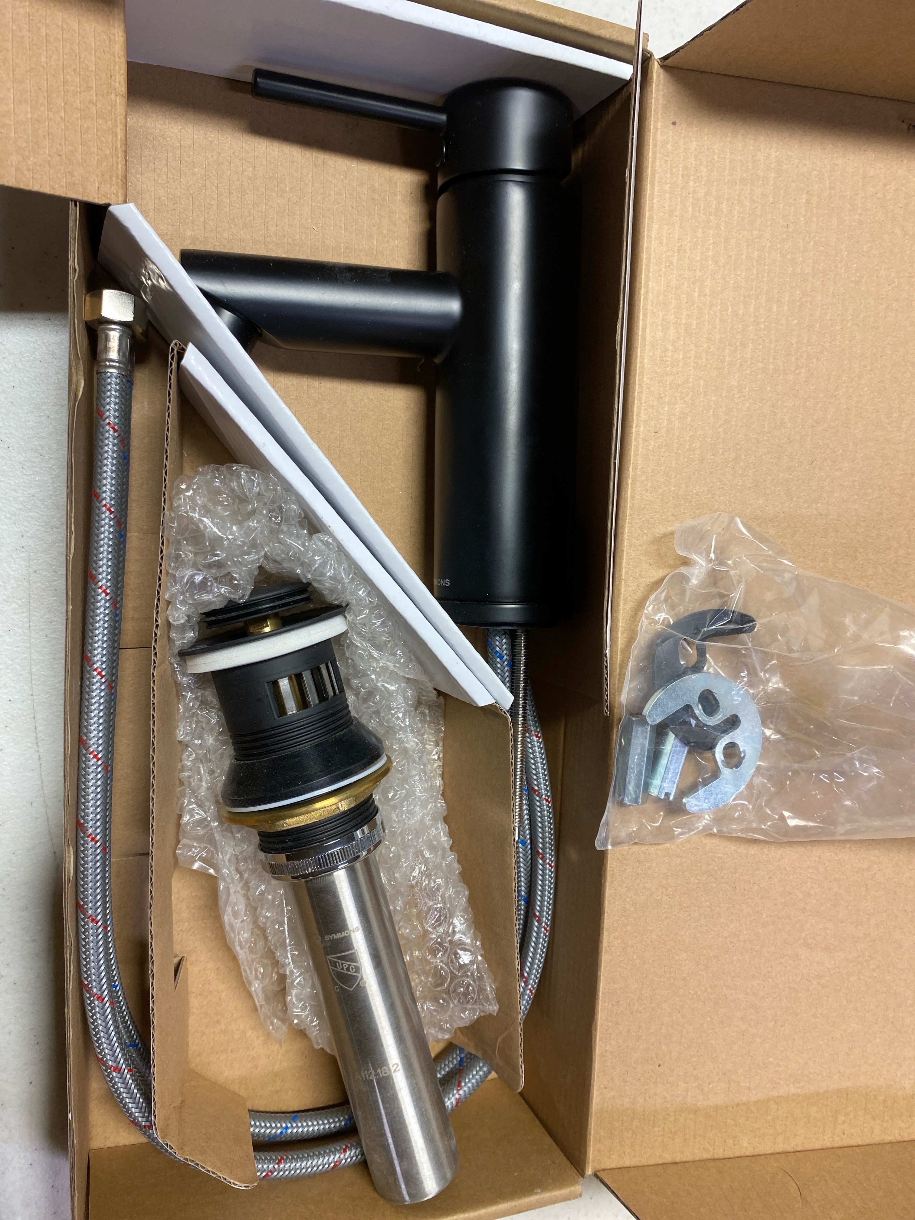 Actual inventory photograph: Symmons SLS3512MBPP Dia 1.0 GPM Single Hole Bathroom Faucet with Push Pop Drain Assembly - Matte Black