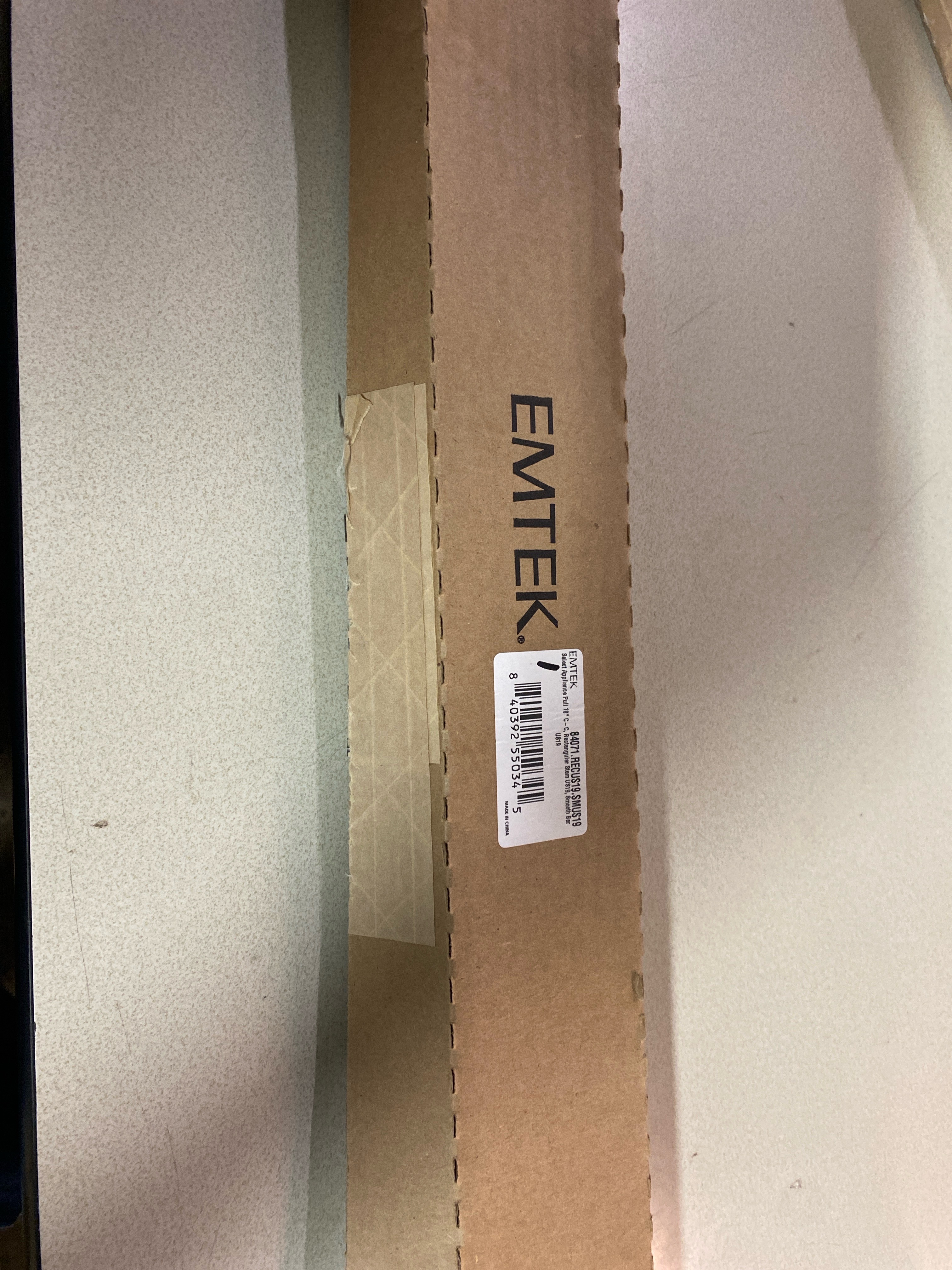 Actual inventory photograph: Emtek 84071.RECUS19.SMUS19 Smooth 18 Inch Center to Center Bar Appliance Pull with Rectangular Stem from the SELECT Collection - Flat Black / Flat Black Stem