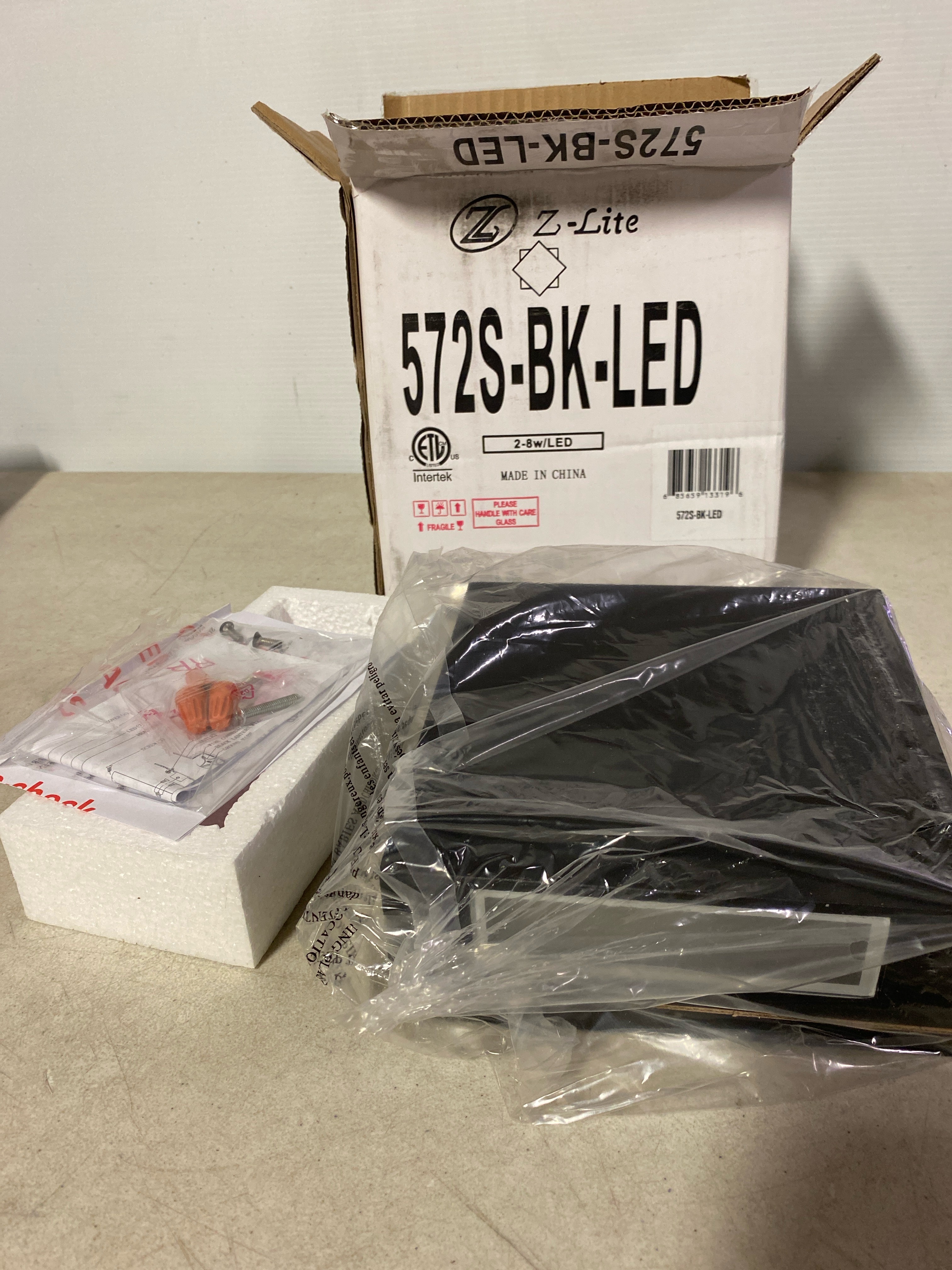 Actual inventory photograph: Z-Lite 2 Light Outdoor Wall Sconce 572S-BK-LED
