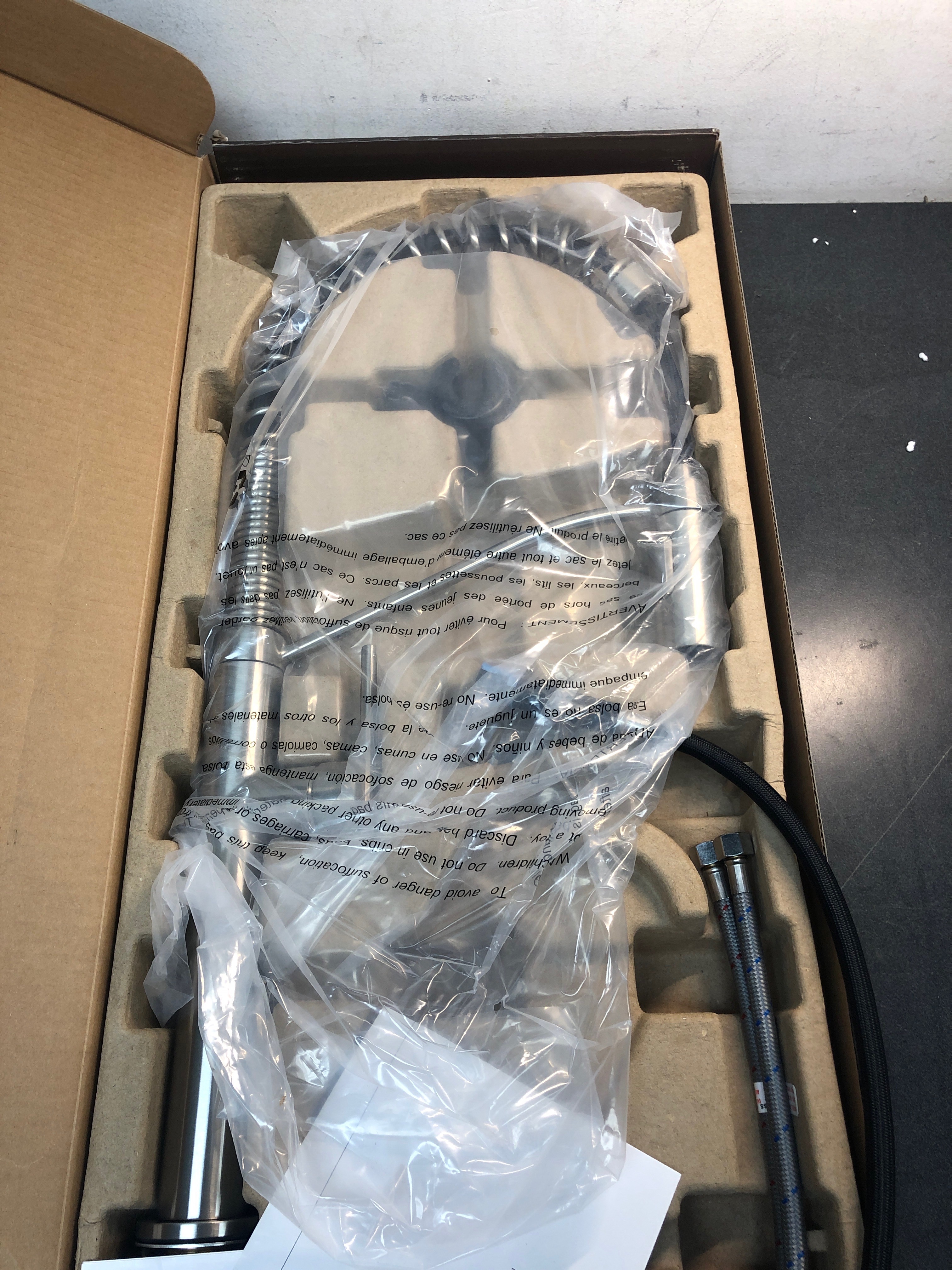 Actual inventory photograph: Signature Hardware SHXCEL107ZSS Eiler 1.8 GPM Single Handle Deck Mounted Pre-Rinse Pull Down Kitchen Faucet - Stainless Steel