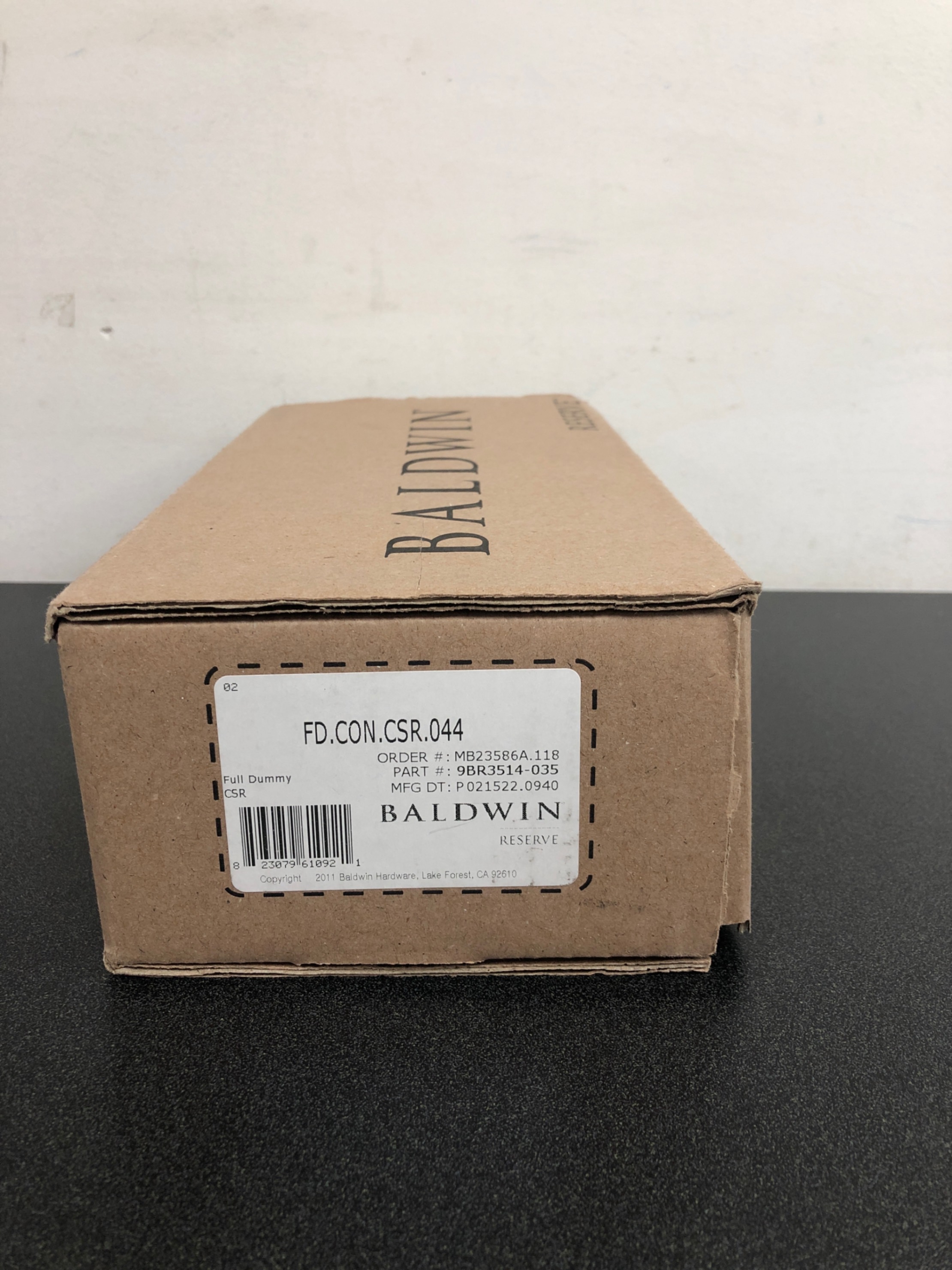 Actual inventory photograph: Baldwin FDCONCSR044 Contemporary Non-Turning Two-Sided Dummy Door Knob Set with Square Rose - Lifetime Satin Brass