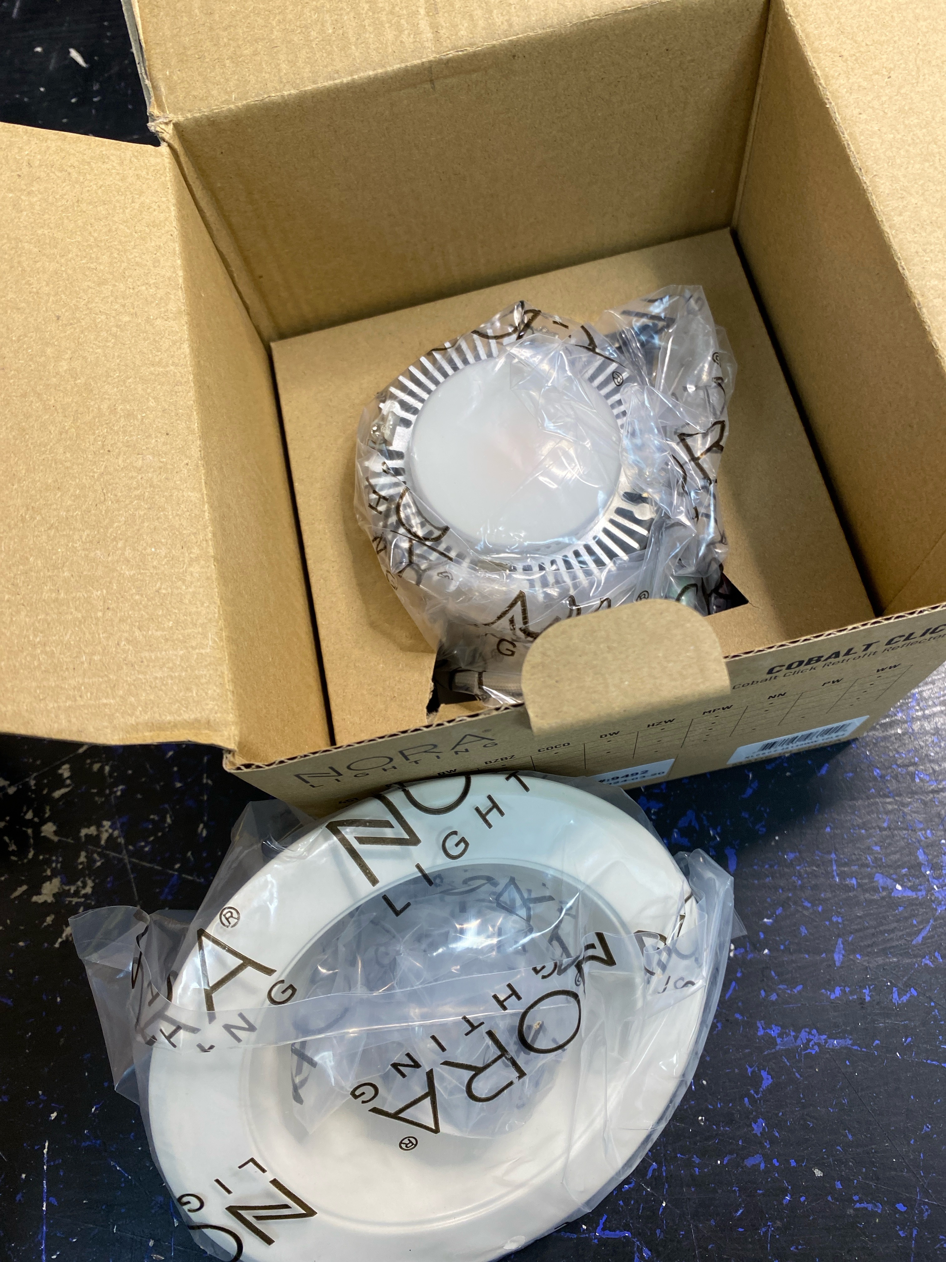 Actual inventory photograph: Nora Lighting NLCBC2-45130WW/10LE4 Cobalt 4" Integrated LED Open Recessed Trim - White / White