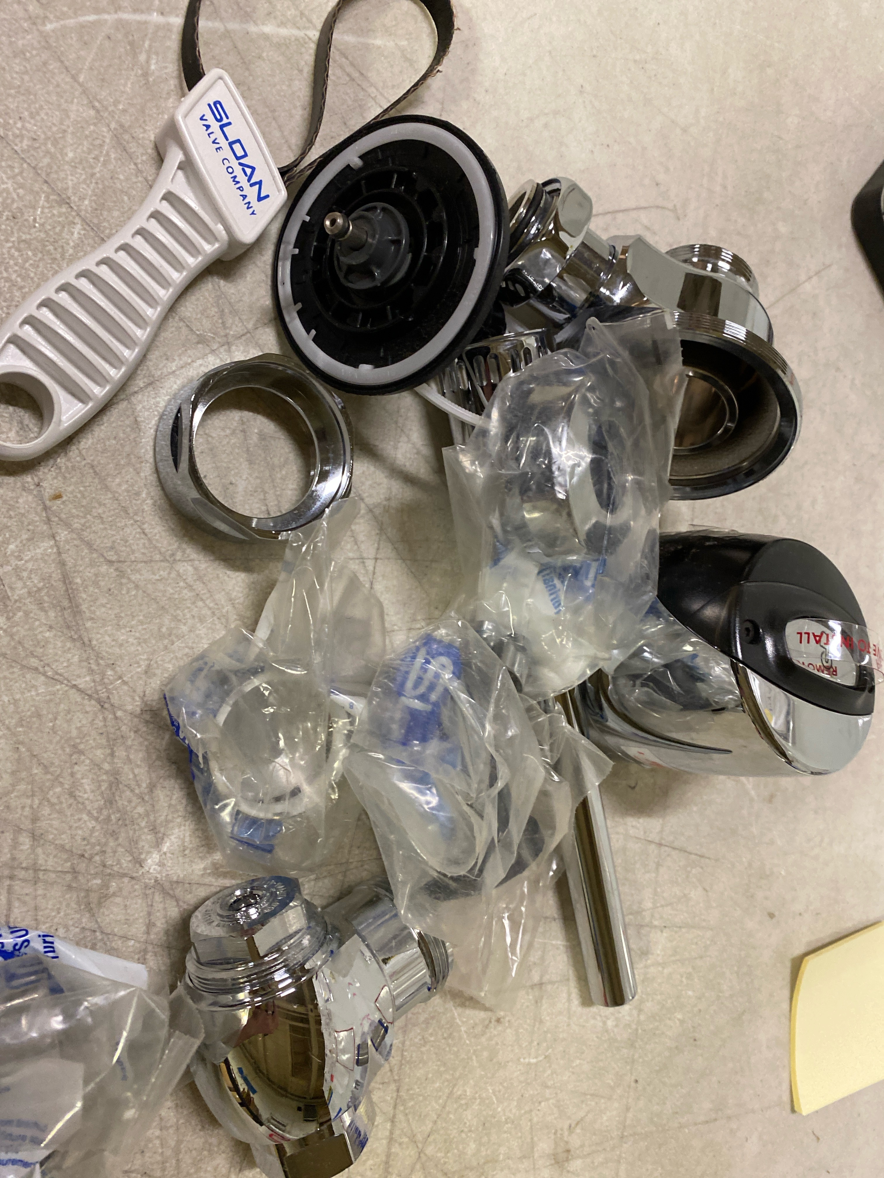 Actual inventory photograph: Sloan SOLIS 8186 Exposed Sensor Urinal Flushometer, 0.125 GPF Valve - Solar-Powered, Infrared Sensor w/Courtesy Flush Override Button, Single Flush, Fixture Connection Top Spud, 3370010