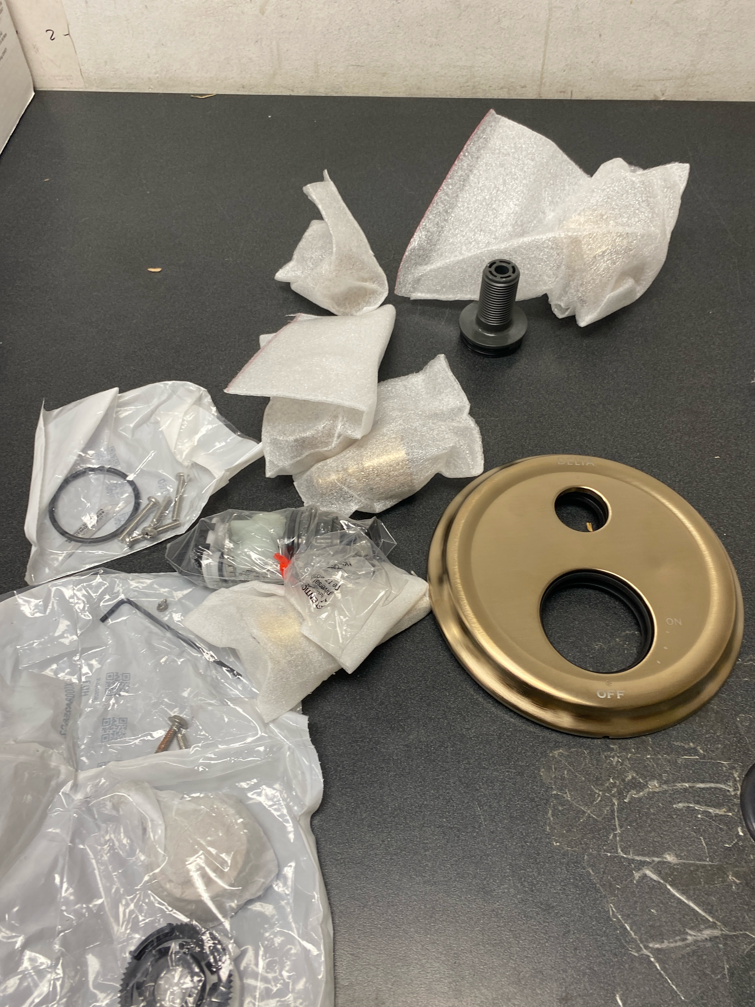 Actual inventory photograph: Delta T27897-CZ Cassidy Gold 2-Handle Wall-Mount Valve Trim Kit with 3-Setting Int Div in Champagne Bronze (Valve not Included)