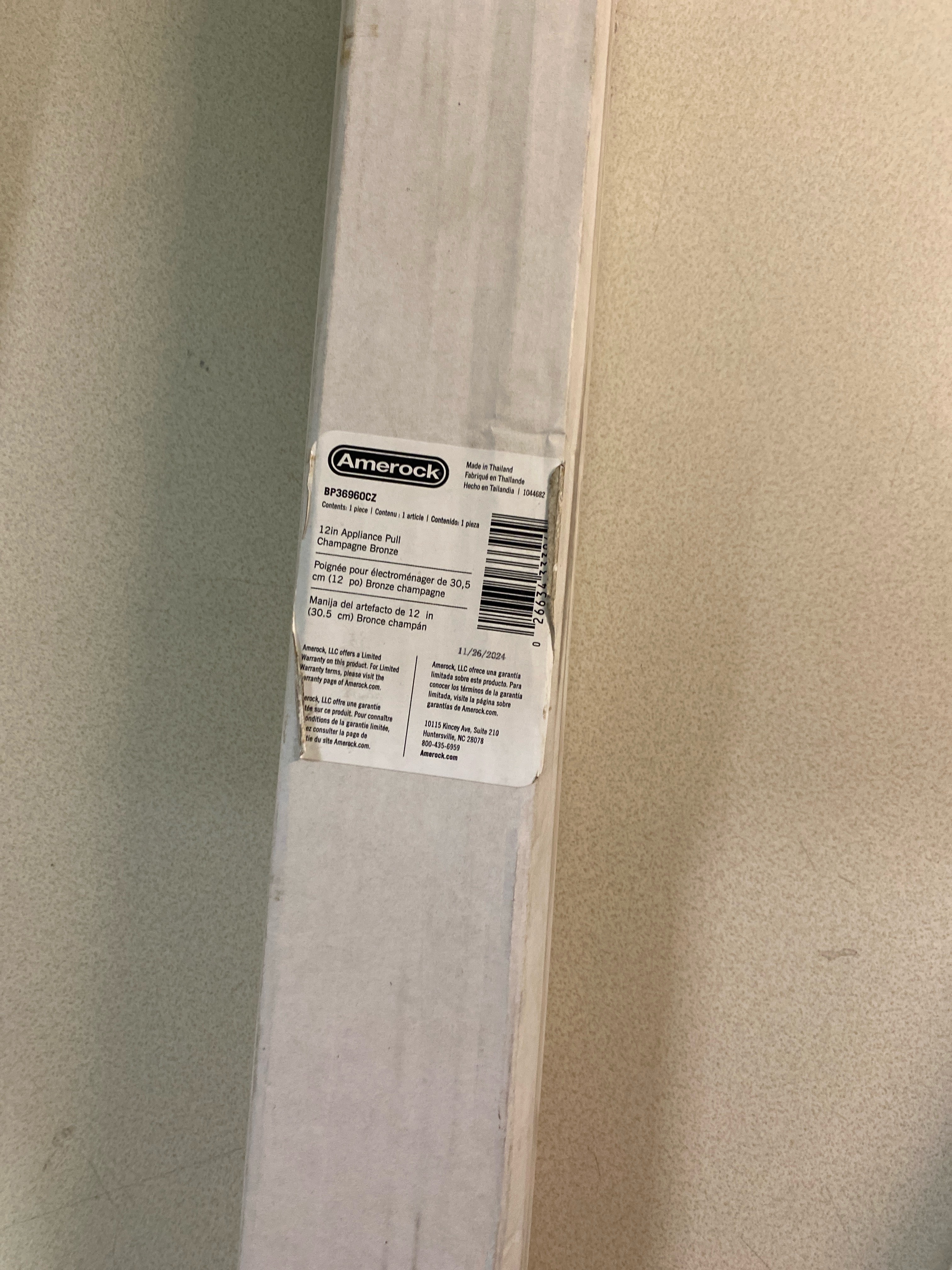 Actual inventory photograph: Amerock BP36960CZ Caliber 12 Inch Center to Center Bar Cabinet Pull - Champagne Bronze