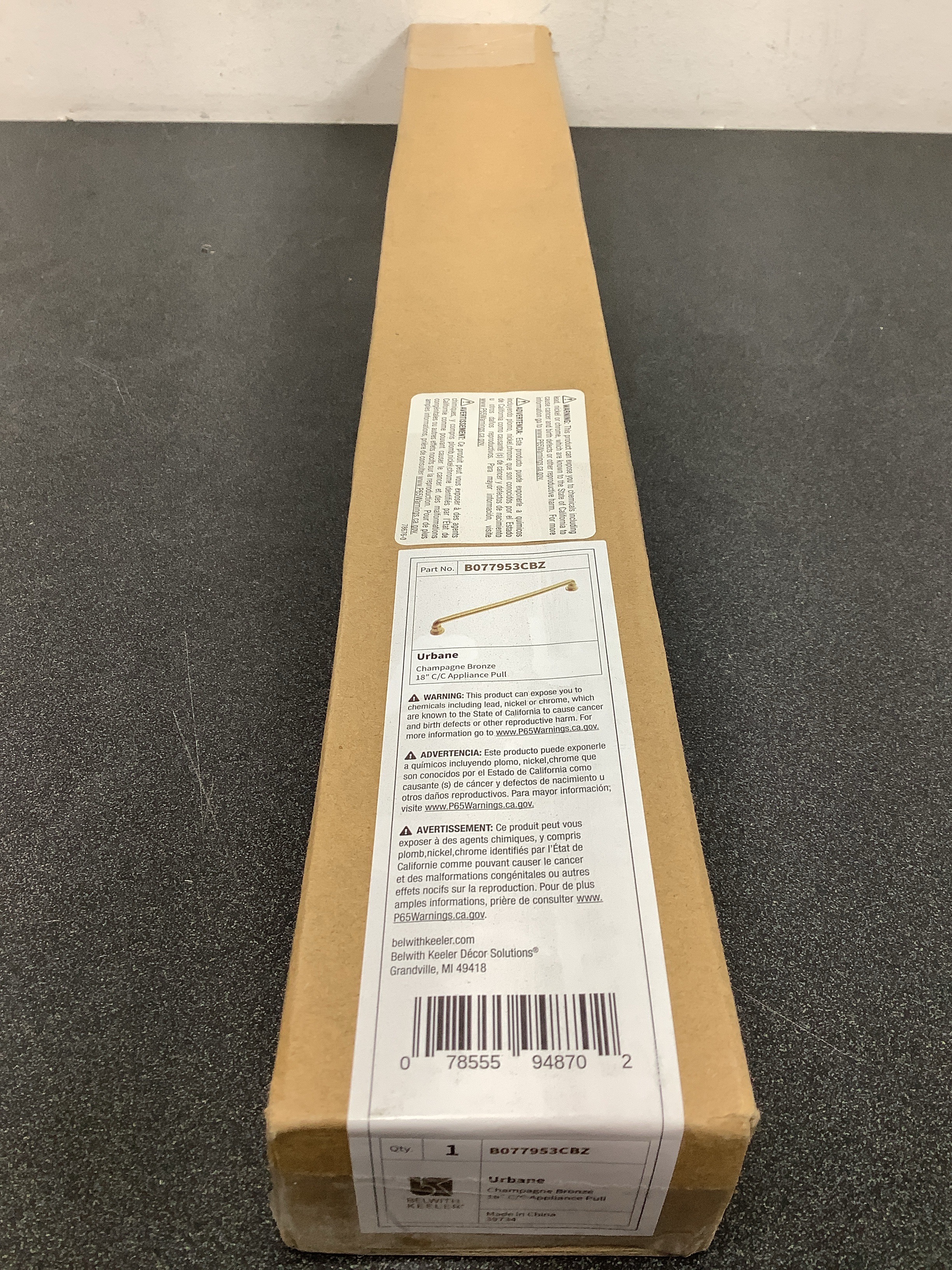 Actual inventory photograph: Belwith Keeler B077953CBZ Urbane 18" Center to Center Modern Industrial Pipe Appliance Handle / Appliance Pull - Champagne Bronze