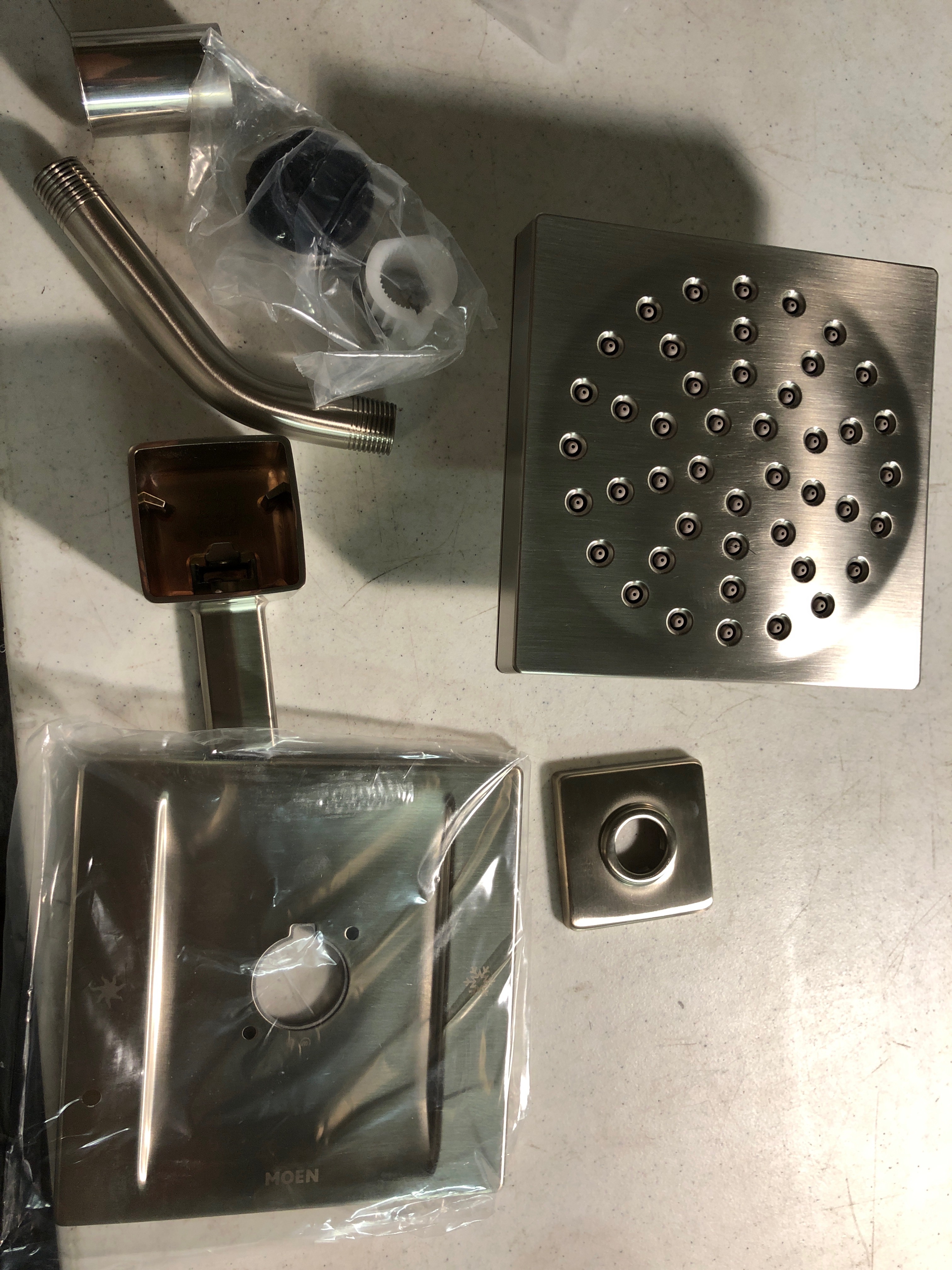 Actual inventory photograph: Moen TS2712BN Single Handle Posi-Temp Pressure Balanced Shower Trim with Rain Shower Head from the 90 Degree Collection - Less Valve - Brushed Nickel