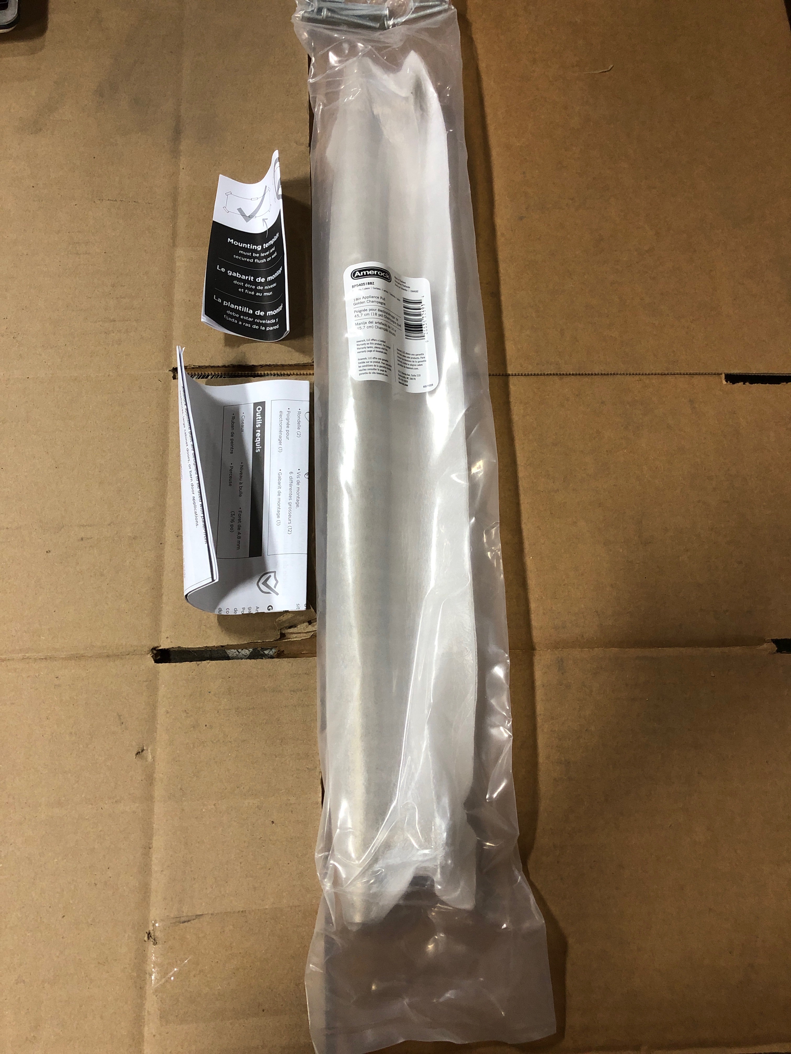 Actual inventory photograph: Amerock BP54051BBZ Radius 18 Inch Center to Center Bar Appliance Pull - Golden Champagne